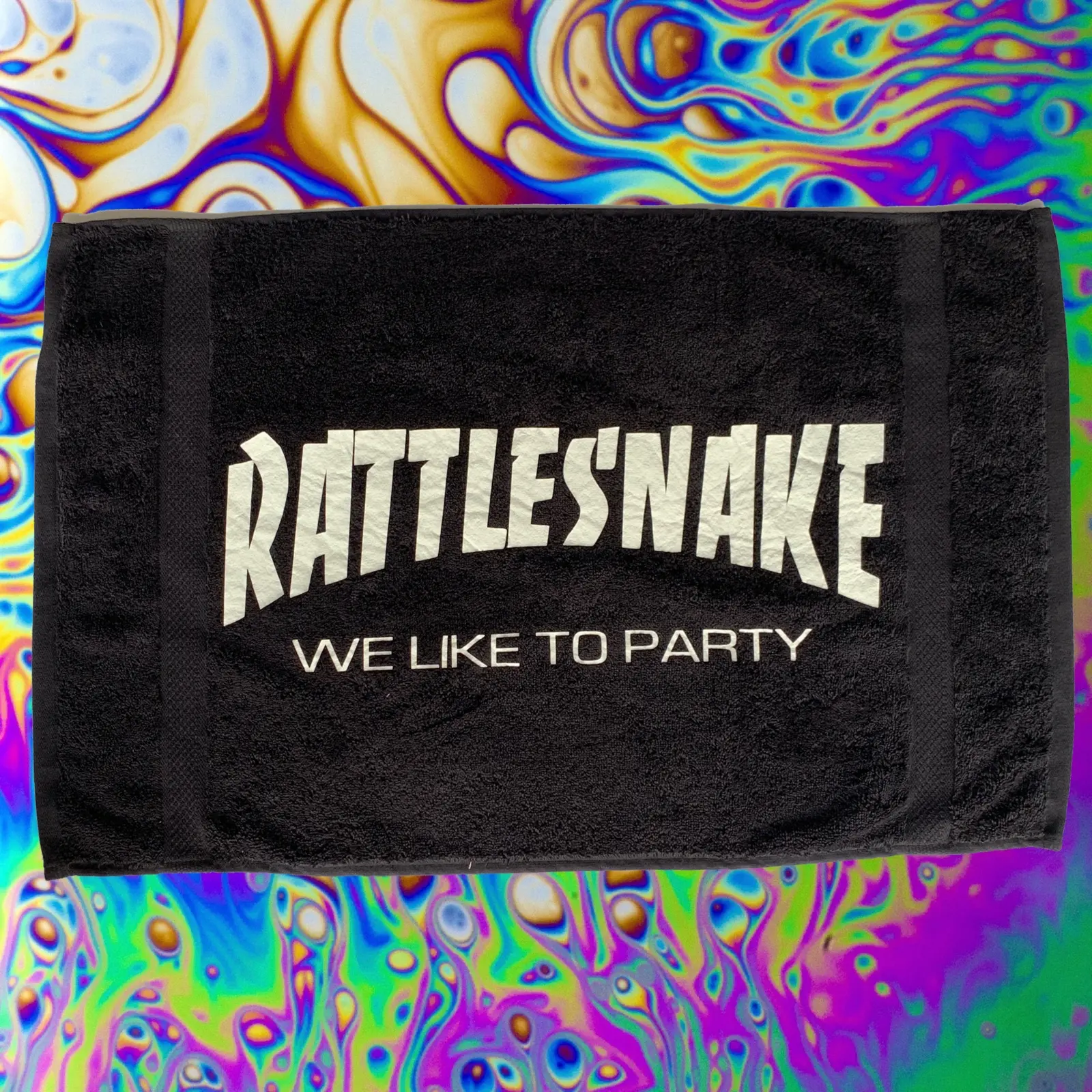 Rattlesnake — We Like To Party towel on psychedelic swirl